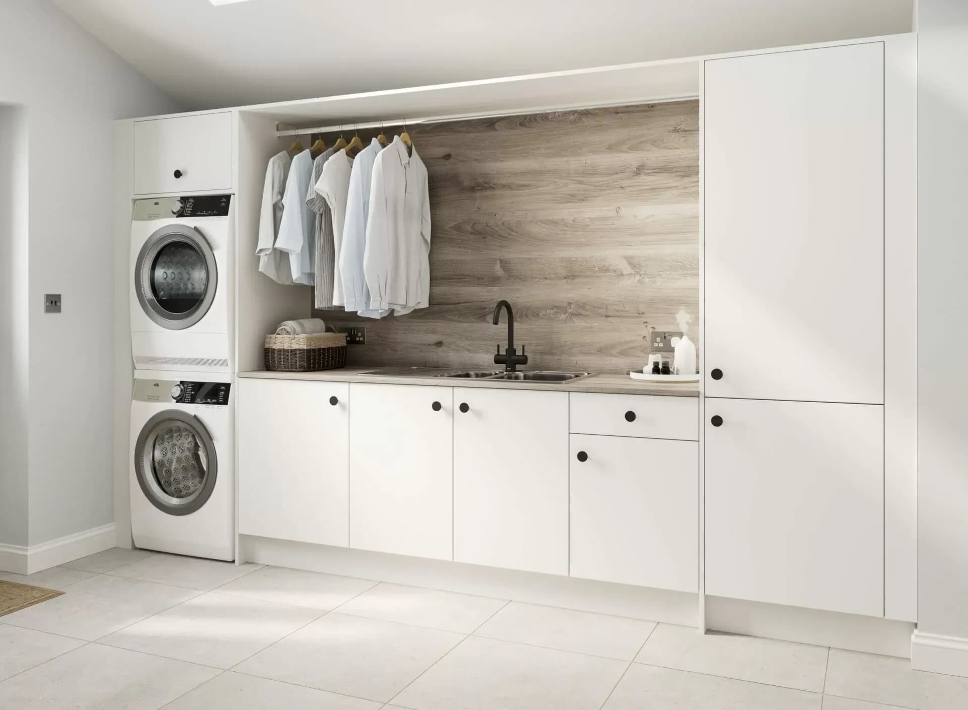 Urban White laundry room by Bentley Kitchens