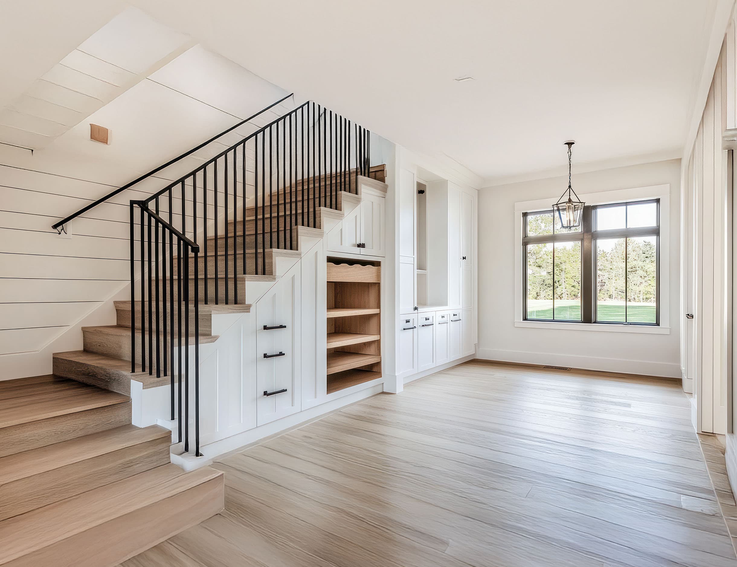 Bespoke understairs storage example - custom fitted cabinetry