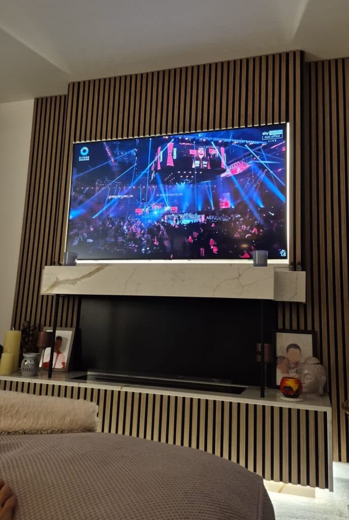 Bespoke media wall with integrated bioethanol fireplace